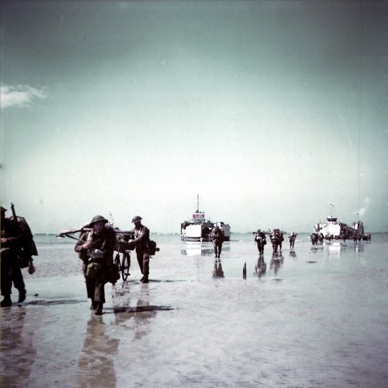 colourphotographofcanadiantroopscomingashorejunobeach.jpg