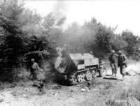 fourgiwithburninggermansdkfz250halftrack_small.jpg