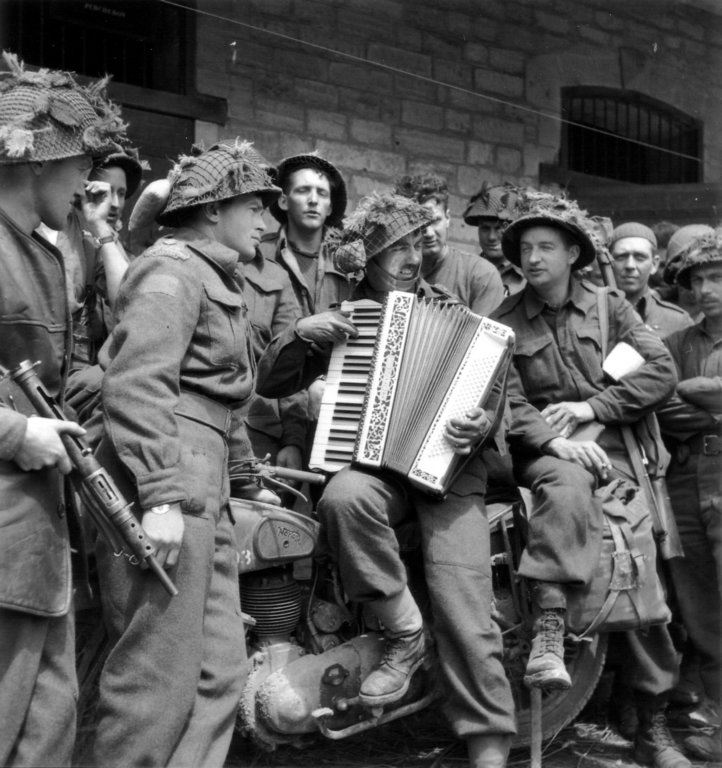 groupofcanadiantroopswithaccordion.jpg