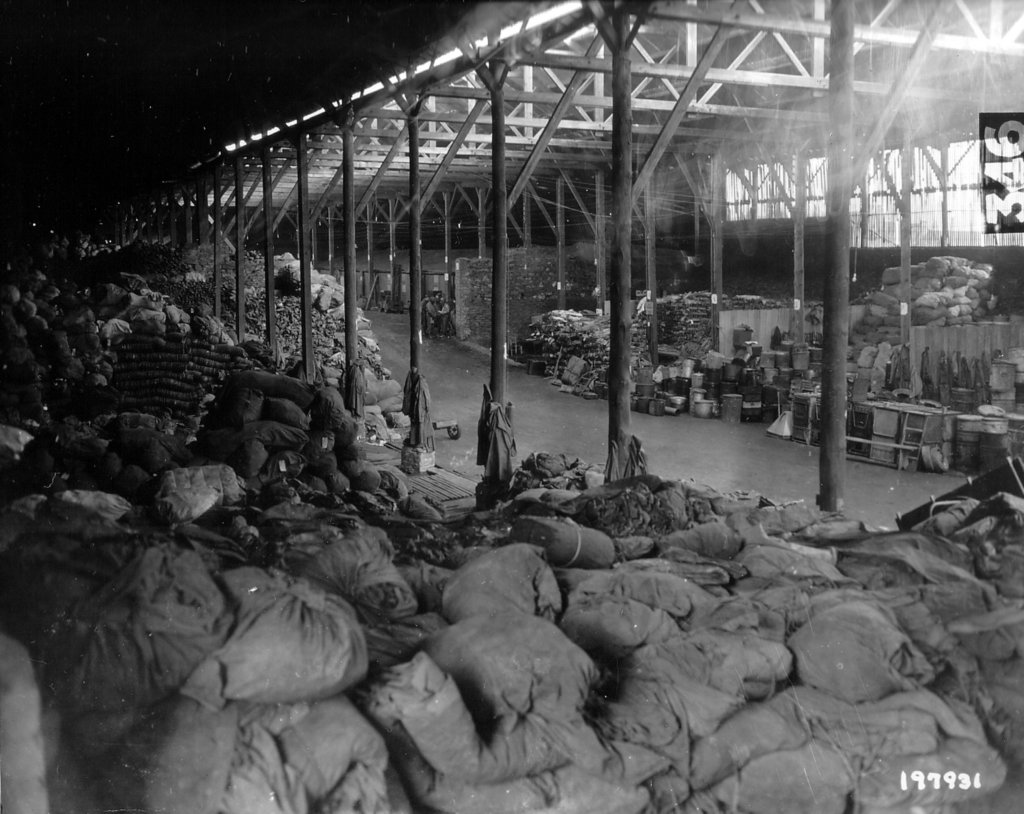 interiorofawarehousecherbourg2ndofdecember1944.jpg