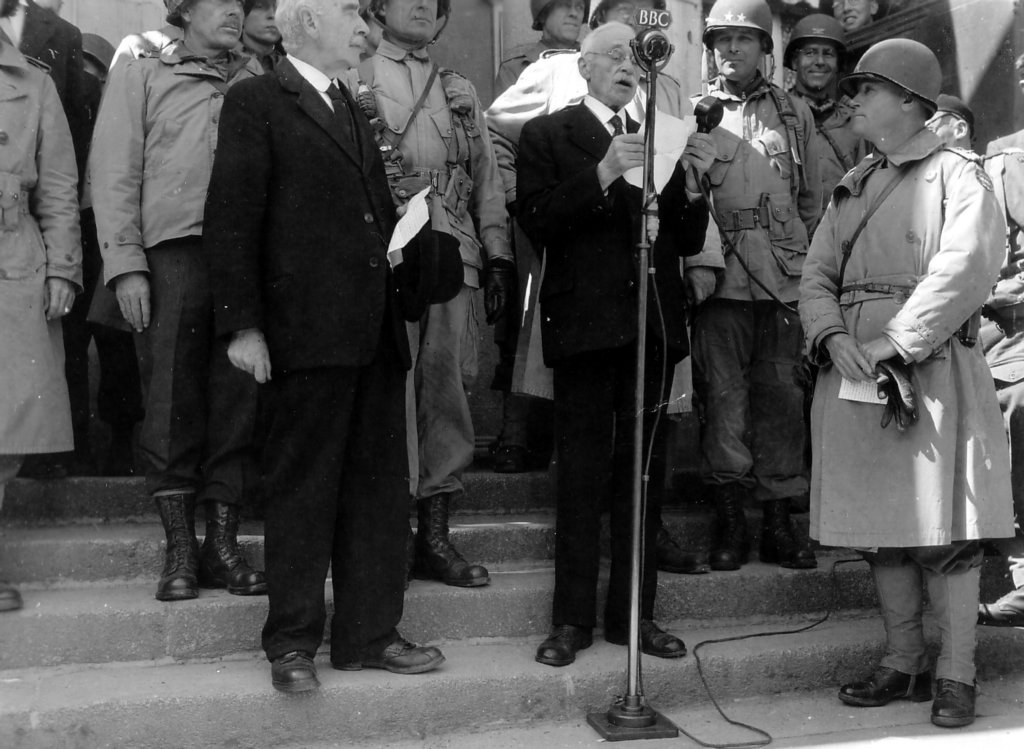 mayorofcherbourgdrpaulrenaultgivesspeechduringliberationceremony.jpg