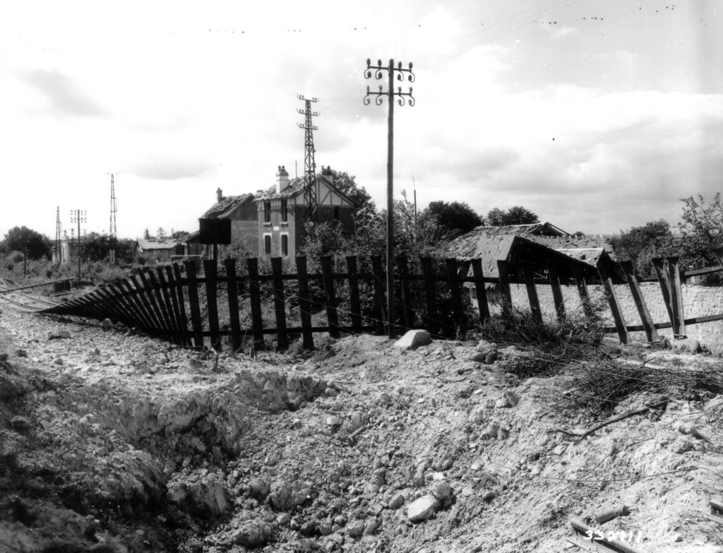 railwaylinetornupbyartilleryfirebagnolesdelorne.jpg