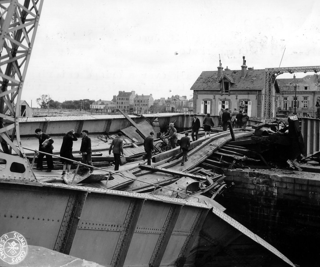 swingbridgesabotagedbythegermansonthe24thofjune1944.jpg