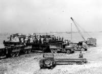 transportbargeunloadingatomahabeach_small.jpg