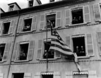 usflagfliesfrombuildingliberationofcherbourgceremony_small.jpg