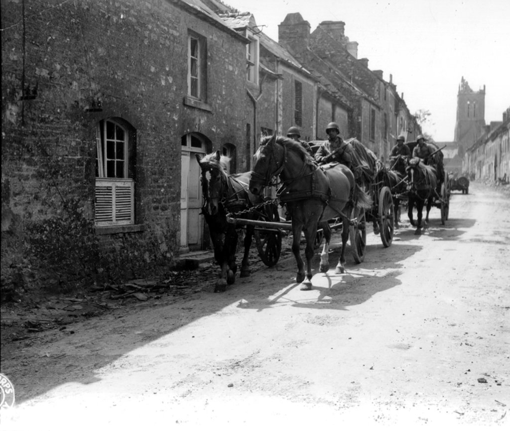 ustroopsinhorsedrawnwagonsmontebourg.jpg