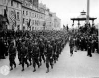 victoryparadeplacedelarpubliquecherbourgjuly14th1944_small.jpg